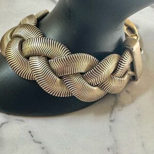 Wide flat herringbone braid gold tone bracelet